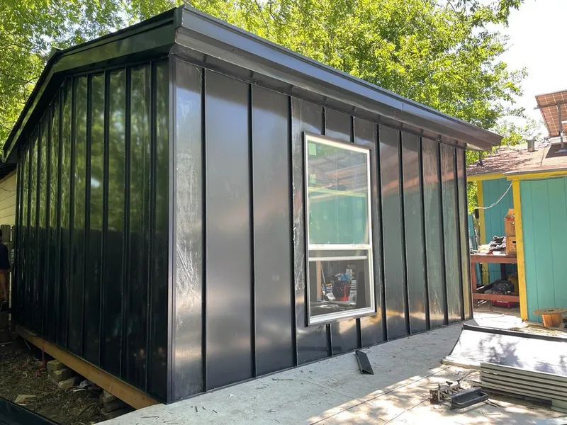 Black standing seam metal wall panels for Roof Inspection in Three Lakes