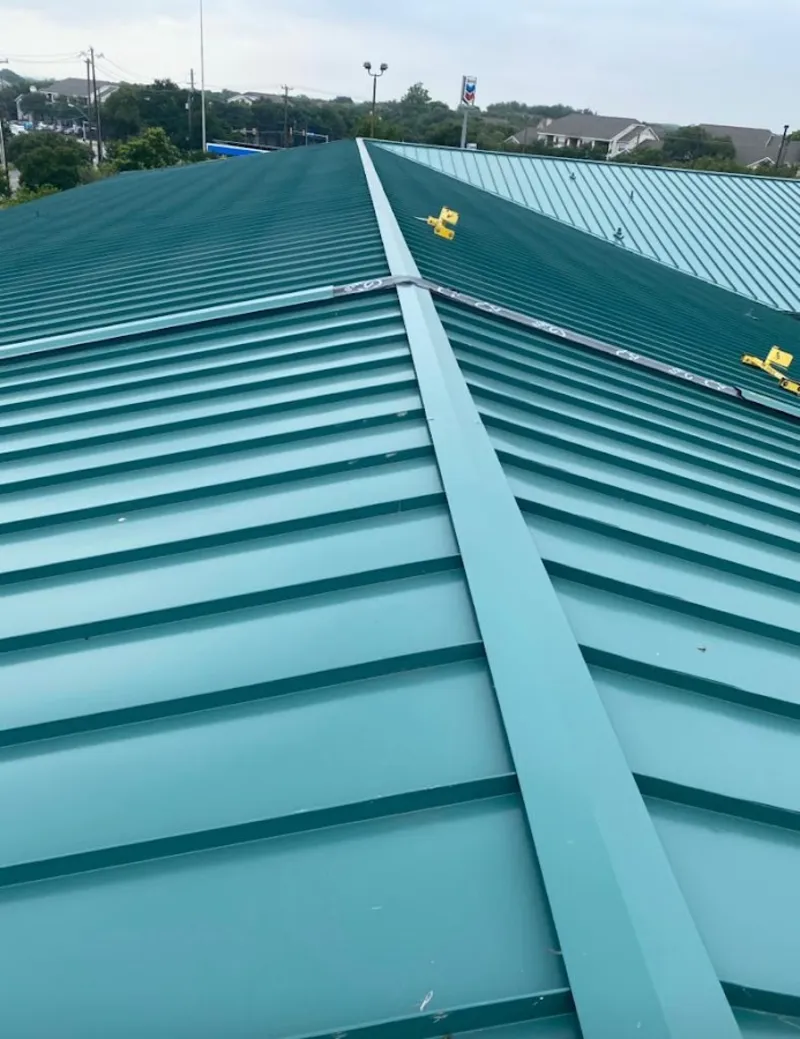 Green commercial metal roof ridge and valley for Metal Roof Repair in Three Lakes